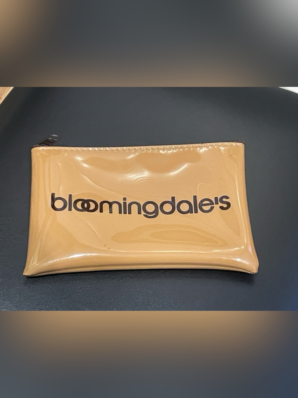 Bloomingdale's Glossy Tan little brown cosmetic pouch EUC